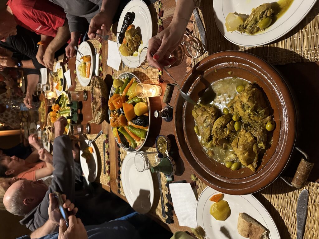 Authentic Moroccan dinner table – traditional Moroccan cuisine in a desert camp restaurant.
