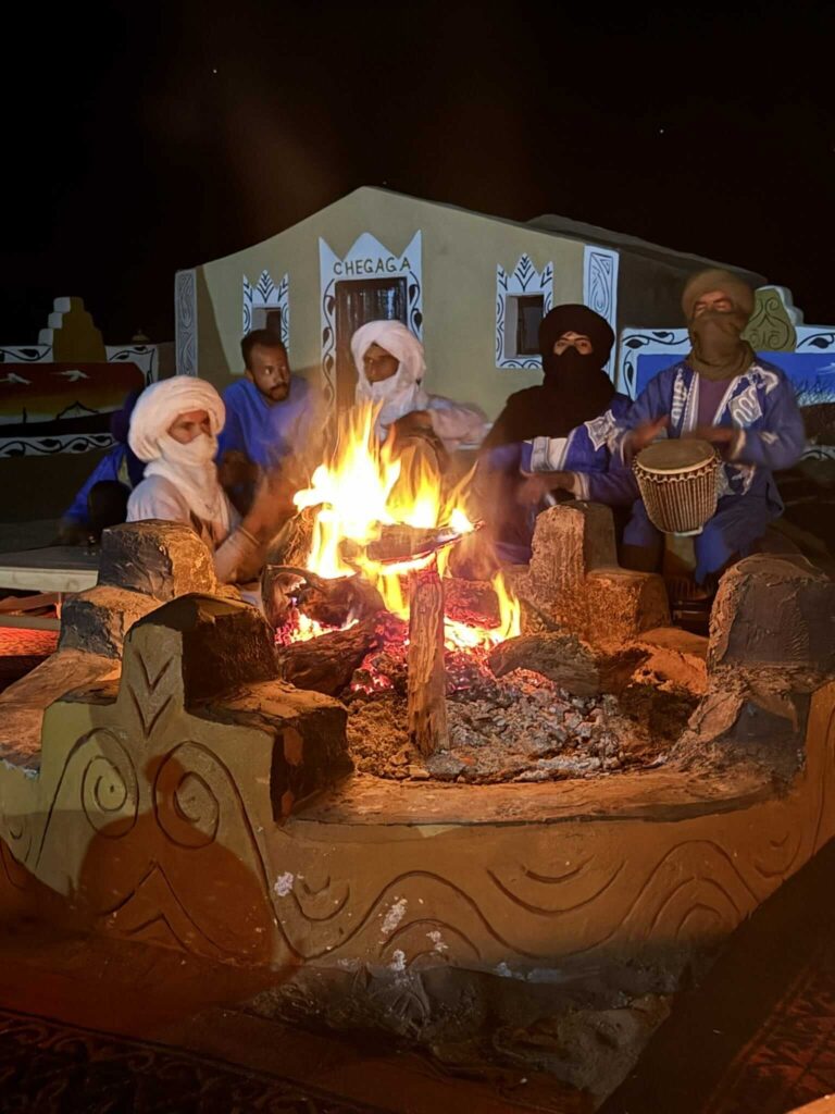 Evening campfire at Sahara desert camp