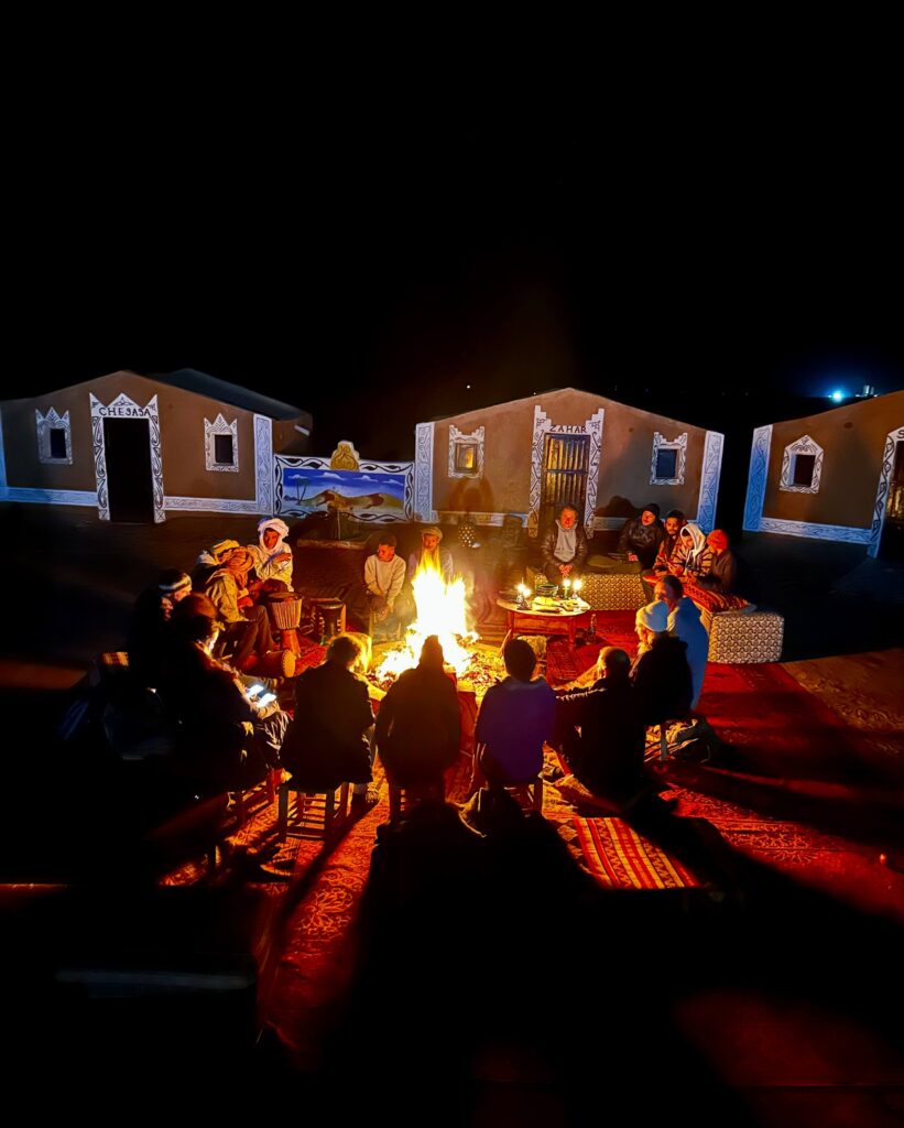 Group of travelers in front of Desert Camp Chraika