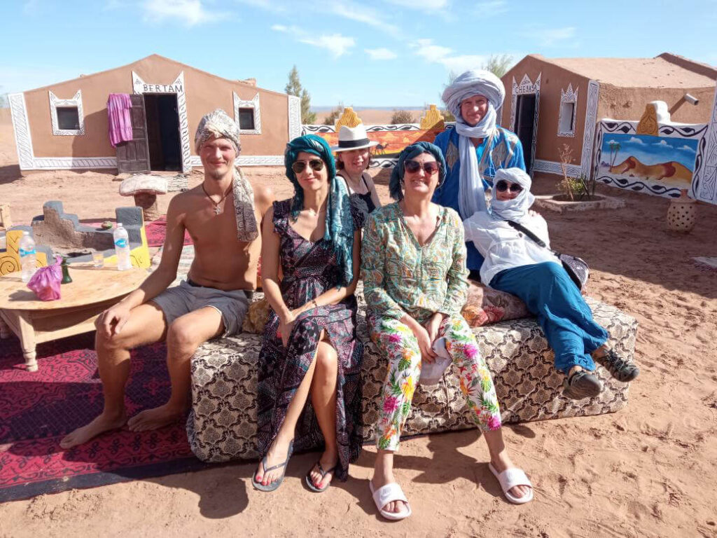 Group photo at Morocco desert camping site