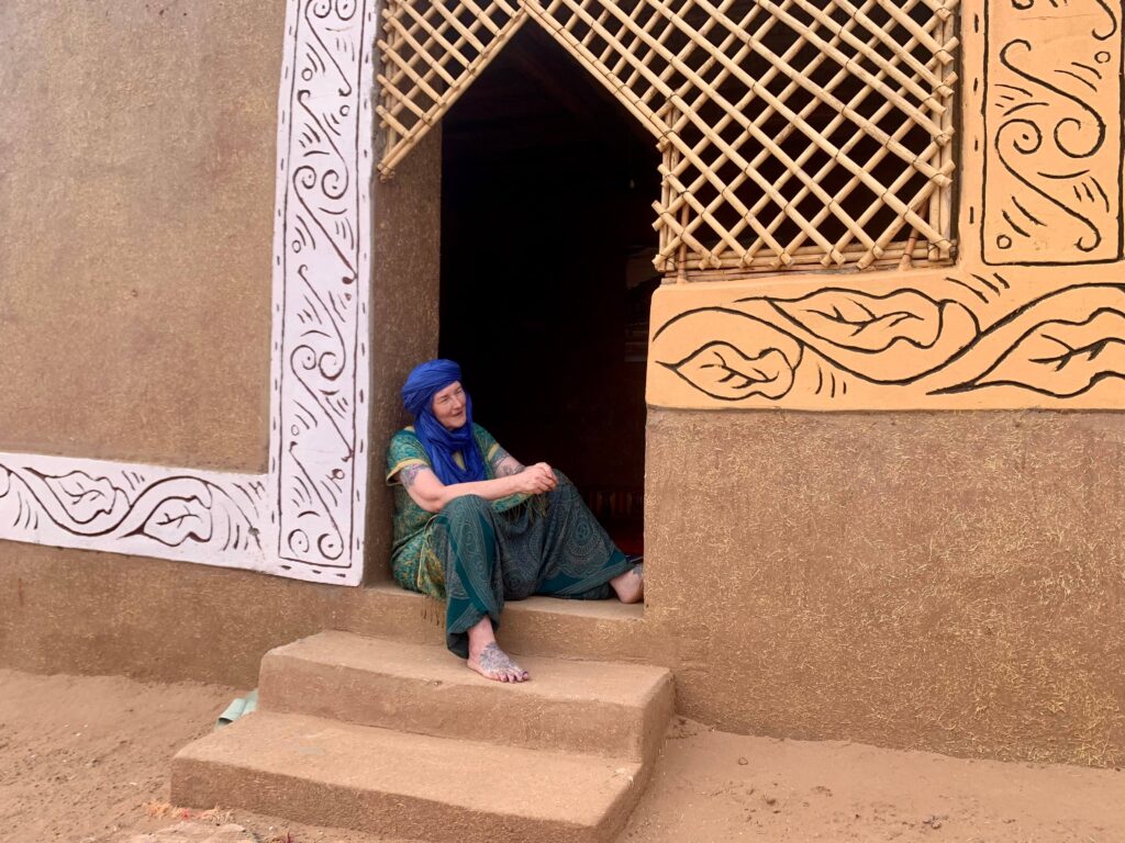 Relaxing at Sahara desert camp Morocco