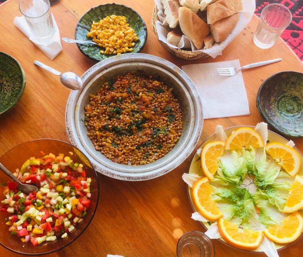 Traditional Moroccan food served with colorful salads and sauces – authentic Moroccan cuisine experience.